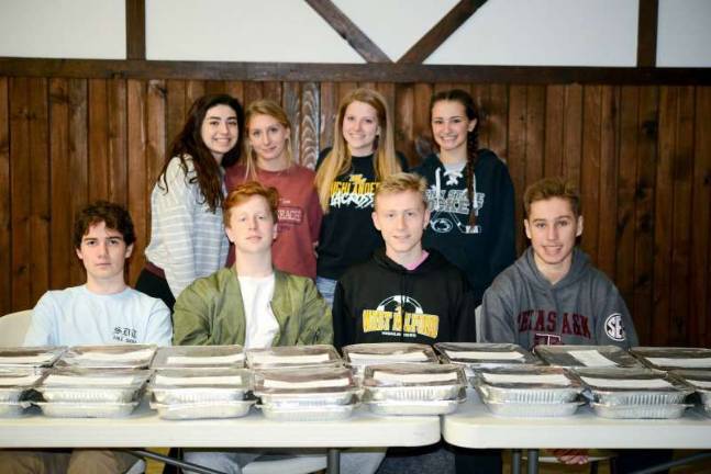 Youth ministry provides meals and more for families in need Youth Ministry members turned out 46 trays of lasagna to donate to their church's food pantry. Back row: Ashley Jacobs, Sera Agostinelli, Aleah Coscis, Gabby Farias. Front row: Aidan Kelly, John Gaffney, Alex Lange, Mitchell Brijbag