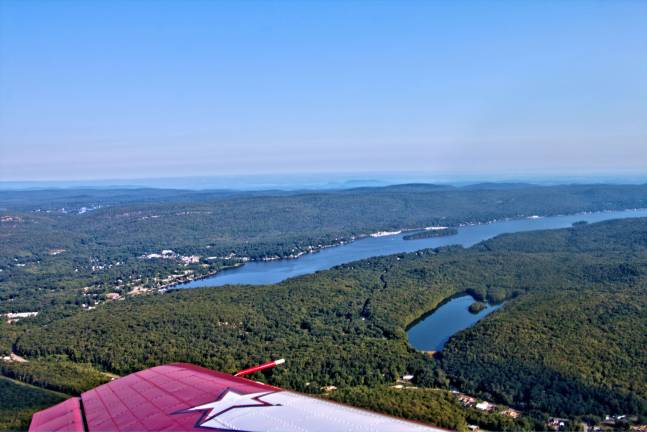Messenger photographer Don Webb hitched a ride one early morning with Marty &quot;Raider&quot; Sheehan and got some great views of Greenwood Lake and the whole West Milford area.