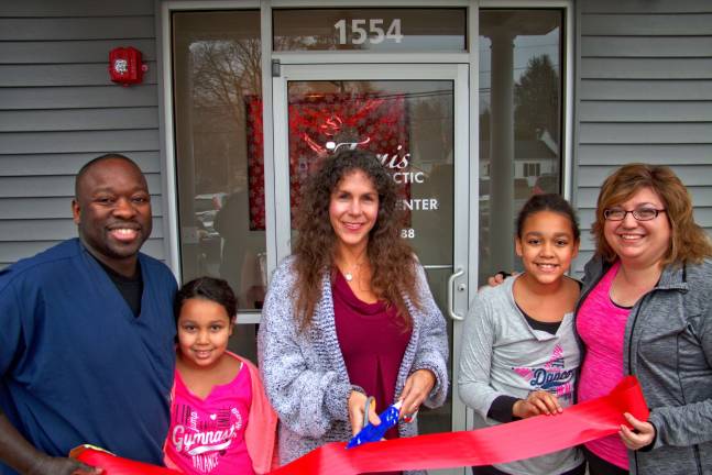 Husband and wife team open Holistic Healing and GCS Fitness Photos by Don Webb Mayor Bettina Bieri, center, cuts the ceremonial ribbon at the grand opening of Holistic Healing and the GCS Fitness. From Left are Caleb Edmond, daughter XXX, Bieri, daughter WHO and Gina Edmond.