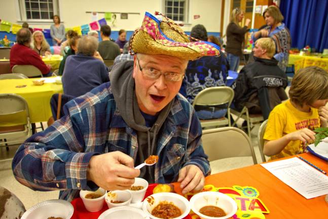 The very best chili around West Milford Messenger photographer Don Webb does a selfie while he too judges the chili contest.