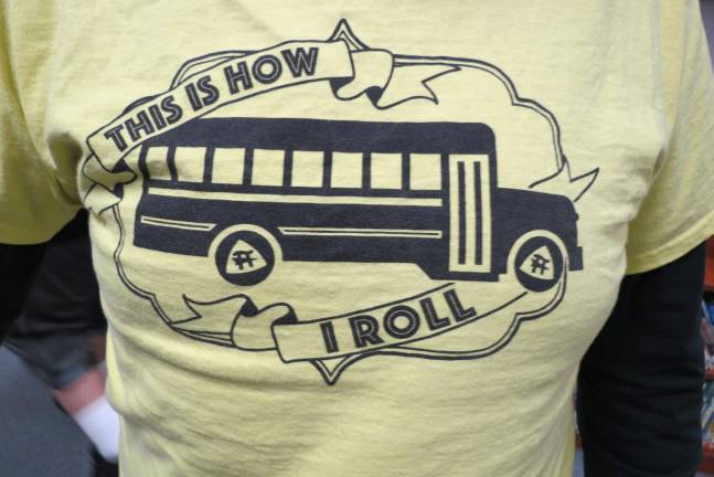 A T-shirt wore by school bus drivers who oppose a proposal to outsource transportation services.
