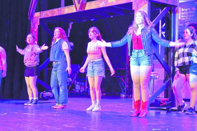 The cast of ‘Footloose’ rehearses Saturday, March 2.