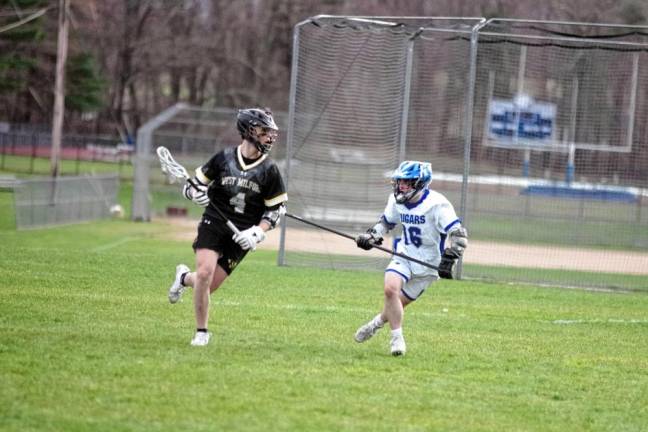 West Milford’s Jake Kelshaw carries the ball as Kittatinny’s Greyson Lobb keeps pace. Kelshaw scored one goal.