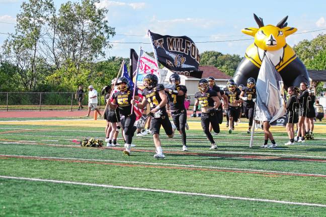 West Milford defeats Paramus, 44-13 The West Milford Highlanders hit the field running. (Photo by George Leroy Hunter)