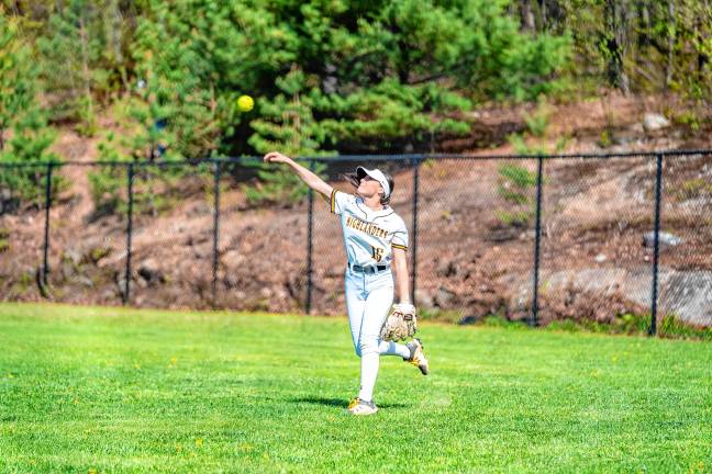 Sports roundup: Highlanders advance in PCT Senior Ally Gruber tosses the ball from the outfield in the game against Wayne Hills on April 30. The Highlanders lost, 12-6.