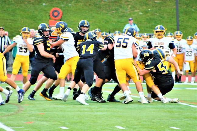 Gang tackle during the Highlanders nail-biter against Vernon. Garrett Hemmerich photo