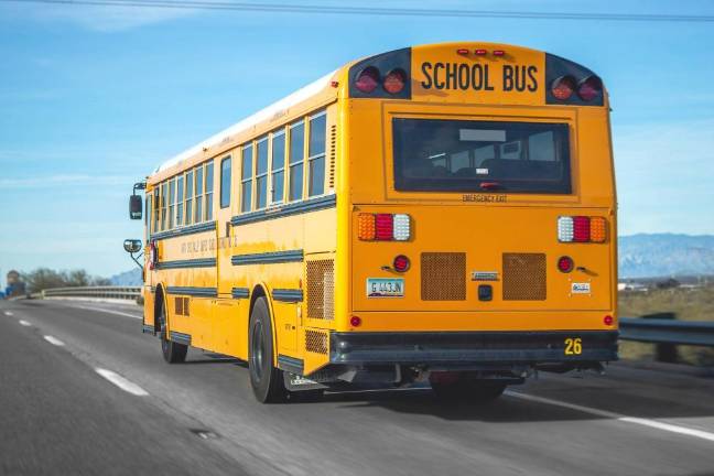 Fine and 5 points announced for passing school buses loading or unloading passengers Fine and 5 points announced for passing school buses loading or unloading passengers