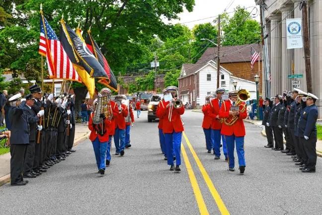 Honoring the fallen The Franklin Band marches in the Memorial Day Parade last year in Franklin. (File photo by Maria Kovic)