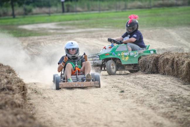 Top acts and ‘good old-fashioned fun’ at fair <b>Power racing behind the outdoor entertainment area</b>