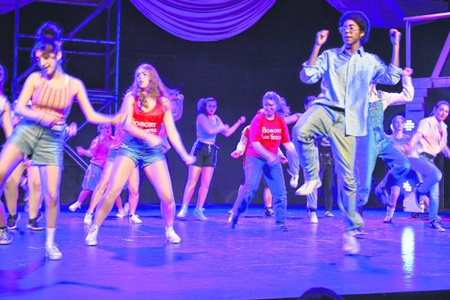 The cast of ‘Footloose’ rehearses Saturday, March 2.