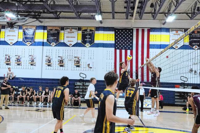 Sports roundup: Shatzel wins 3 gold medals Jefferson's Dorian Kaminski taps the ball above the net. He made 12 kills, three blocks, three digs and two aces.