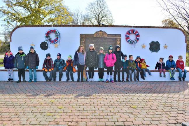 Scouts prepared memorial for annual Veterans Day service.