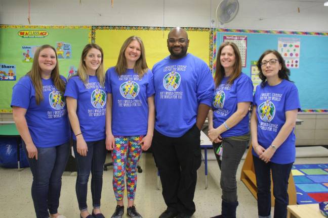 District 'lights it up blue' for autism awareness The ABA staff at Marshall Hill, dressed in their blue to mark autism awareness. From left, Melissa Teresco, Lindsay Hefferon, Karyn Reinhold, Scarly Elmera, Dorrie Torp and Denise Shorter.