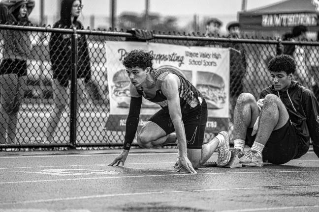 Lowenstein 10th in state Lorenzo Andrade lines up in the blocks before the 200-meter run at the Passaic County Championship meet May 8.