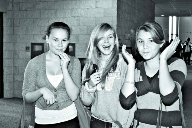 Girls, girls and more girls Kali Wright, Angela Perez and Molly Cheevers of Hardyston take a lollypop break.