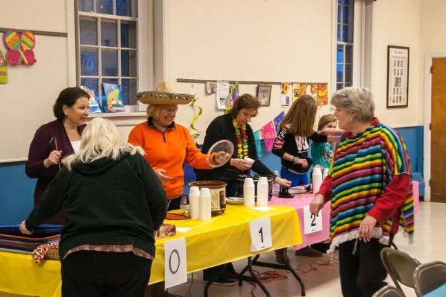 Chili cook-off is hot Volunteers served up the chili.