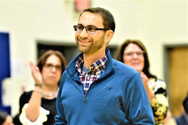 Teacher Daniel Willever, a native of West Milford, finds out he just won a $25,000 Milken Foundation educator award at Ramsey High School.