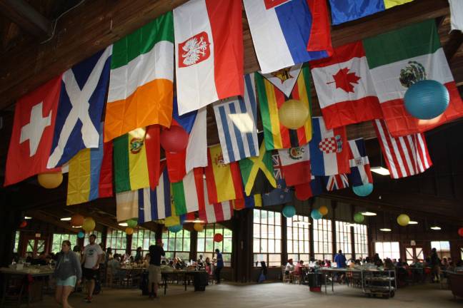 The Summer of a lifetime Staff from around the world work at 4 Youth. Flags representing nearly all of them hang in the cafeteria building where the kids eat each day.