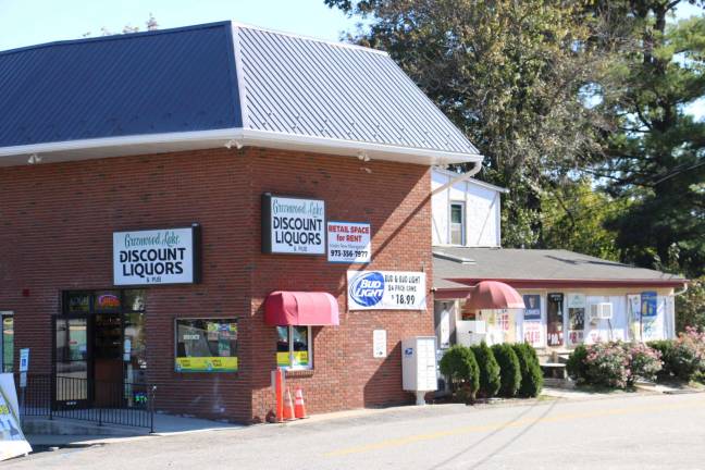 The owner of Greenwood Lake Discount Liquors in West Milford is protesting a new distribution ordinance he and others feel will harm their businesses. photo by Don Webb