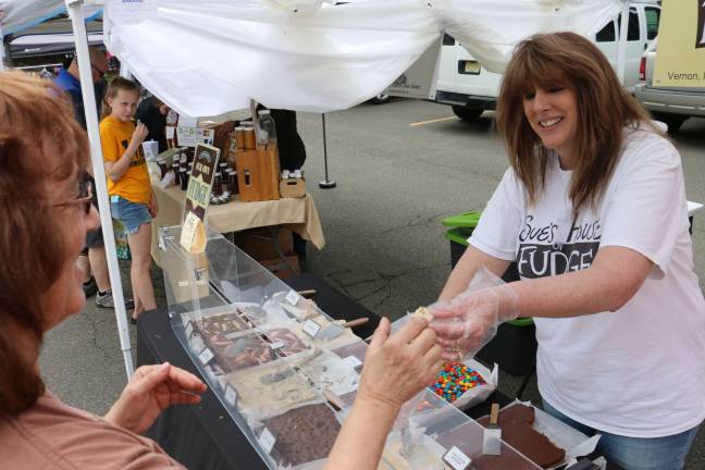 A bounty at the farmers' market Sue Garbowski of Vernon's Sue's House of Fudge asks.. "would you like a sample?"