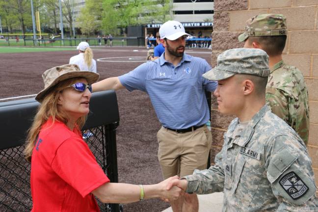 An honor on Military Appreciation Day ROTC members of Seton Hall thanked Einbinder for her 22 years of USMC service.