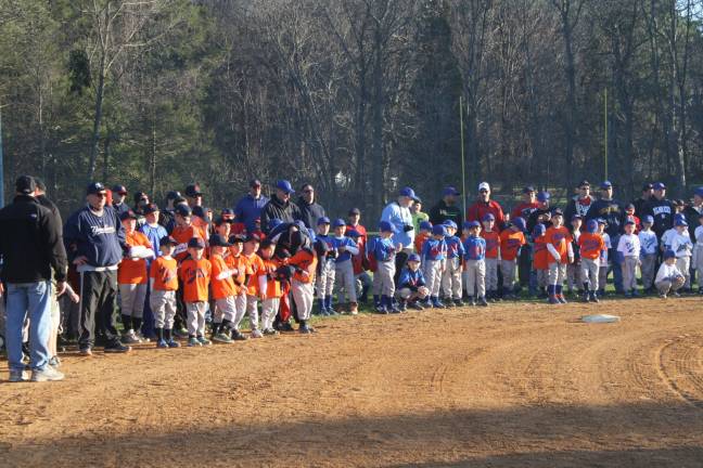 Yankee Willie Randolph kicks off the Little League season Teams lined the infield as they were announced last Thursday to open the Little League season.