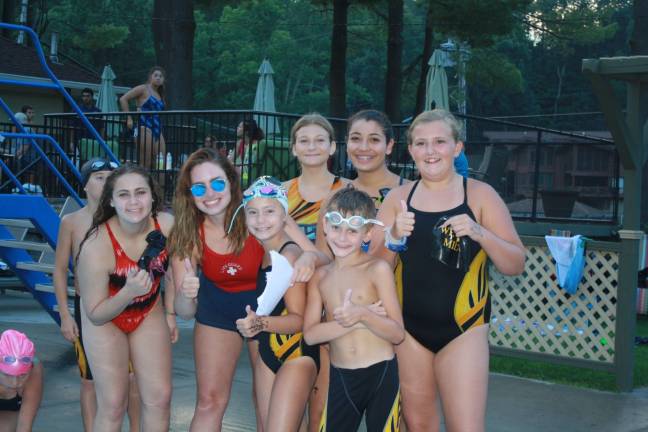 Young West Milford Devil Rays come up short against Lake Mohawk Hawks Photos by Rose Sgarlato From left, Hailey Babitz, Abby Johnson, Julia Reily, Gabby Klimcuzuk, Tara Mufasa, Olivia O’Mahoney and Matthew Evans of the West Milford Devil Rays at Lake Mohawk Pool.