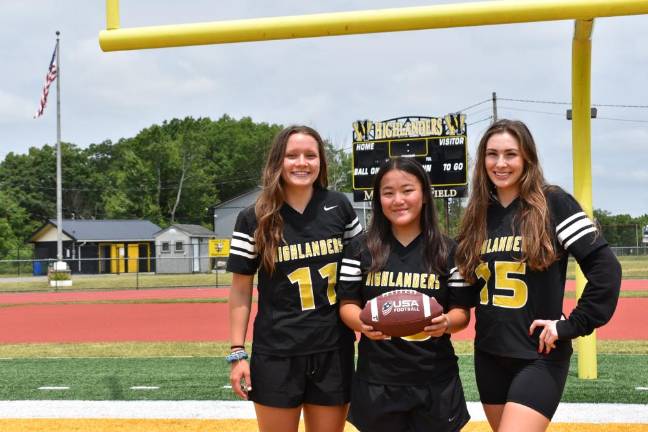 Girls flag football club wins respect From left are seniors Jakki Galella, Mei Dennison and Megan Van Kirk, members of West Milford High School’s first girls flag football club. (Photos by Rich Adamonis)