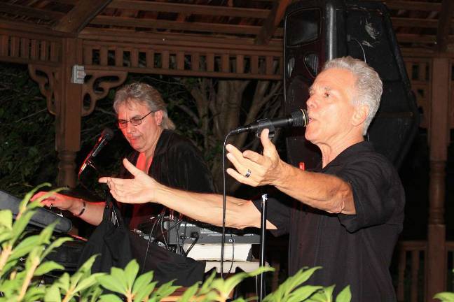 Doo-woping with the Streets of the Bronx Photos by Ginny Raue "Streets of the Bronx" band rocked the crowd at Bubbling Springs.