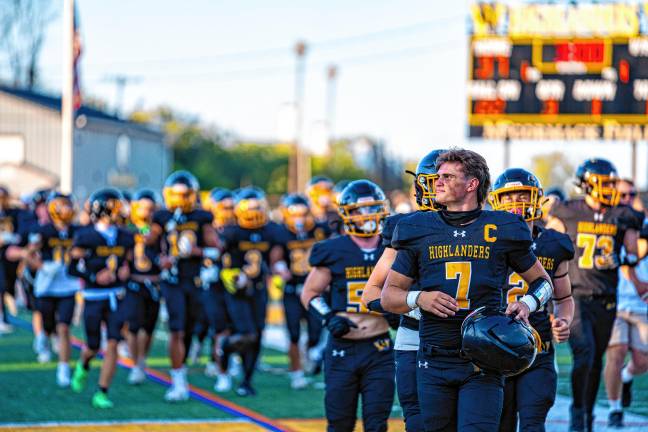 West Milford defeats Paramus, 44-13 Quarterback Aydin Deane leads the team at the season opener. (Photo by TJ Nolan)