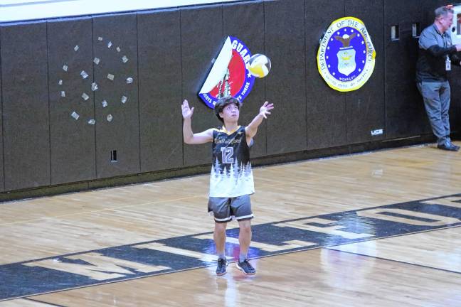 Sports roundup: Highlanders top Passaic, 2-1 West Milford's Johnson Limos in the midst of a serve. He made one kill and six digs.