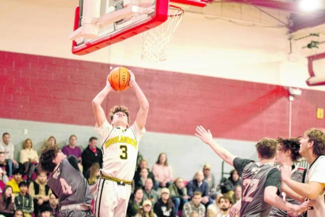 West Milford’s Nash Appell leaps toward the hoop. He scored 14 points.