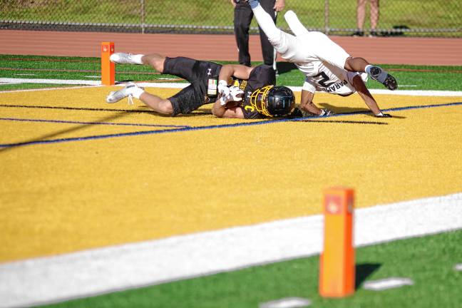 West Milford defeats Paramus, 44-13 WF2 West Milford wideout Patrick Foley lands on the end zone turf for a touchdown in the second half of the home game against Paramus. (Photo by George Leroy Hunter)
