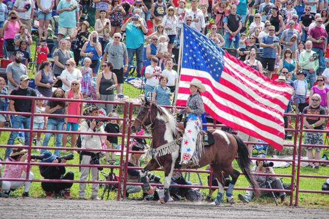 Rodeo is Saturday at Green Valley Farms The Stars and Stripes is paraded proudly in the arena.