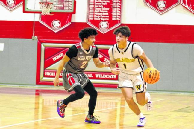 West Milford’s Tyler Liguori is covered by High Point’s Jacob Guinta. Liquori scored 10 points.