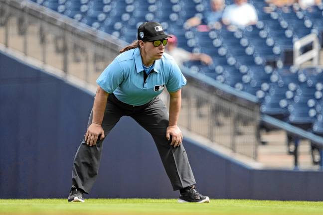 Pawol to be MLB’s first female umpire Umpire Jen Pawol takes her position during the first inning of a spring training baseball game between the St. Louis Cardinals and Washington Nationals on March 4, 2024, in West Palm Beach, Fla. (AP File Photo/Jeff Roberson, File)