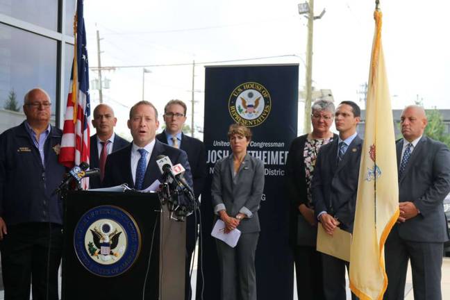 Submitted Photo U.S. Rep. Josh Gottheimer, D-5, addresses the media in Lodi on measures that will keep children safer on school buses.