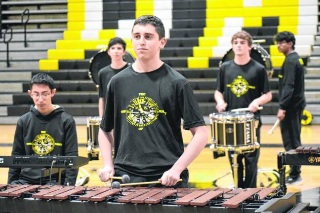 Members of the Wayne Hills High School band perform at USBands indoor percussion event.