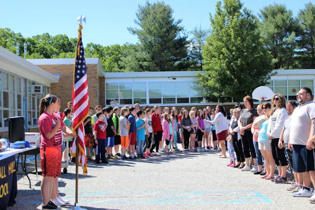 Marshall Hill School travels back in time As with most events, the time capsule ceremony started off with the Pledge of Allegiance.
