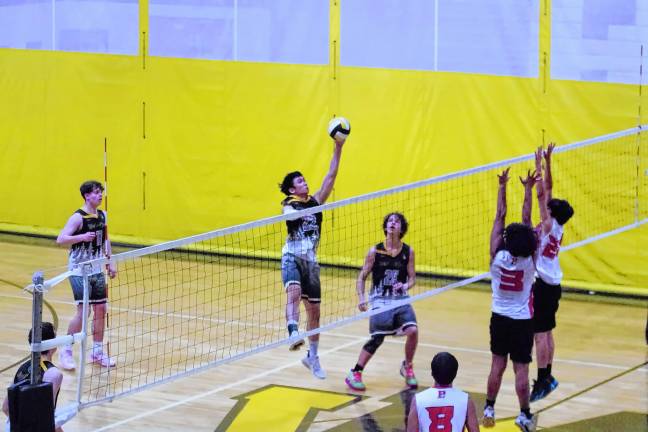 Sports roundup: Highlanders top Passaic, 2-1 West Milford's Anthony Pham strikes the ball high above the net. He made four digs and one assist.