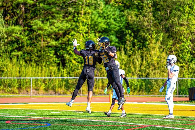 West Milford defeats Paramus, 44-13 WF4 West Milford sophomore Mason LaNeve and senior Jeremiah Christman celebrate a touchdown during the home game against Paramus. (Photo by TJ Nolan)