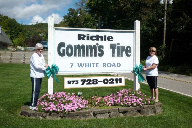 Local women bring awareness to ovarian cancer Cookie Gomm, left, and Jennifer Bishop of West Milford at painting the township teal in an effort to raise awareness of ovarian cancer. September is National Ovarian Awareness Month.