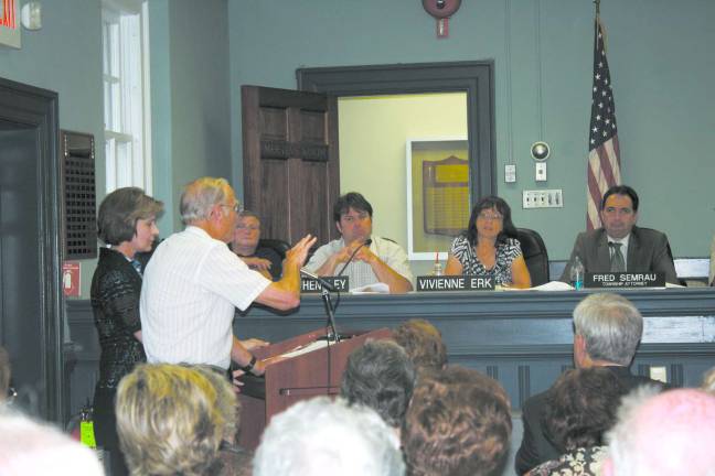 Residents pack the house about Rec Department cuts Photo by Linda Smith Hancharick Interim Administrator Robert Casey and Senior Services Coordinator Gail Kahler address the township council Wednesday night about the services provided by the department. Employees in the department received Rice notices so that the council could discuss restructuring positions.
