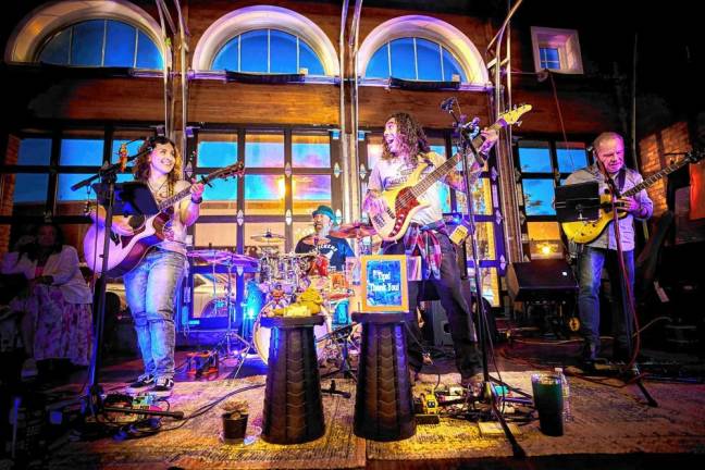 Musicians are ready to party The Sandy Stones XL Trio comes to Cove Castle Restaurant in Greenwood Lake, N.Y., on Saturday night. (Photo courtesy of Sandy Stones Band)