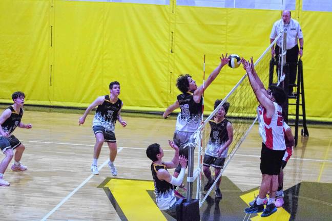 Sports roundup: Highlanders top Passaic, 2-1 West Milford and Passaic battle on the volleyball court May 21. The Highlanders lost, 2-0. (Photos by George Leroy Hunter)