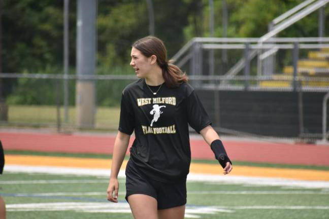 Girls flag football club wins respect Senior Megan Van Kirk gets ready for a play as a receiver.