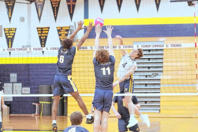 Sports roundup: Falcons advance to MCT semifinal Jefferson's Allan Czerwinski (4) strikes the ball over the net and two Vernon opponents react. He made nine kills, 2.5 blocks, seven digs and one ace.