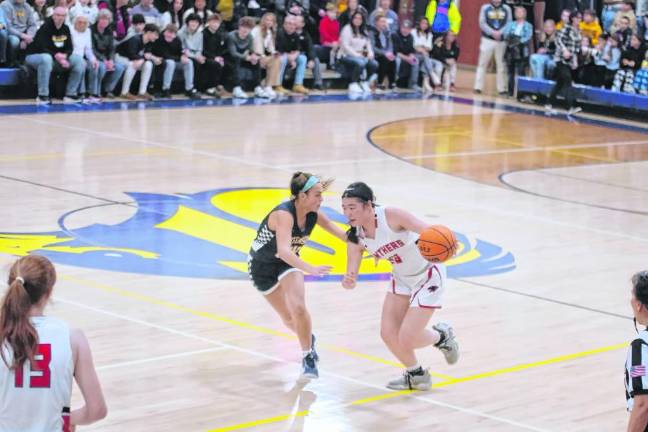 Glen Rock's Mia Vergel de Dios dribbles the ball while covered by Jefferson's Madison Manco.