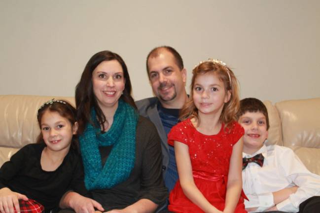 PHOTO PROVIDED Jeff Riley, shown with his wife, Maria, and their three children, is the new lead pastor at Echo Lake Baptist Church on Macopin Road.