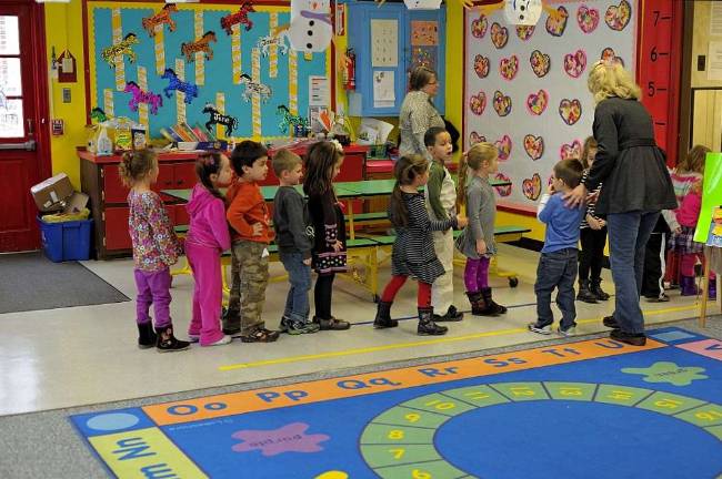Council to decide fate of preschool Photos by Joshua Rosenau Suzanne Hart, right, and Carol Jean Capozzi ready their class for play time.